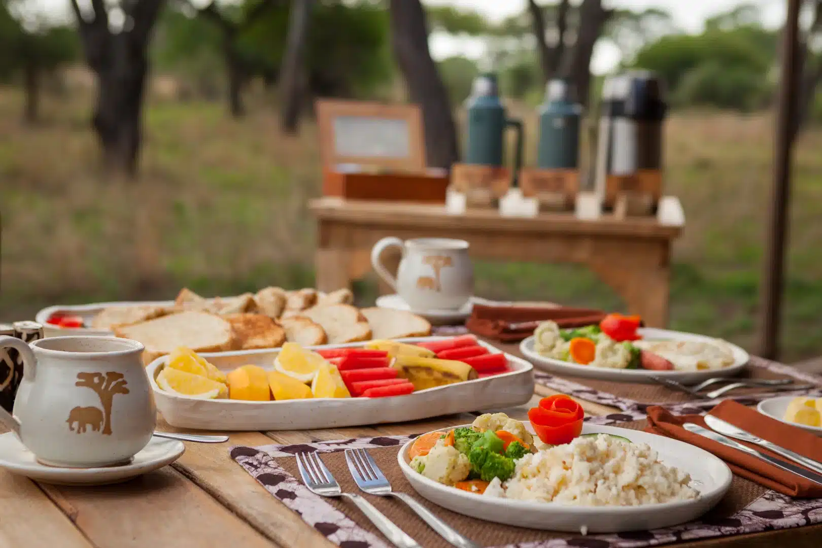 A breakfast spread on a bush table at Baobab Tented Camp