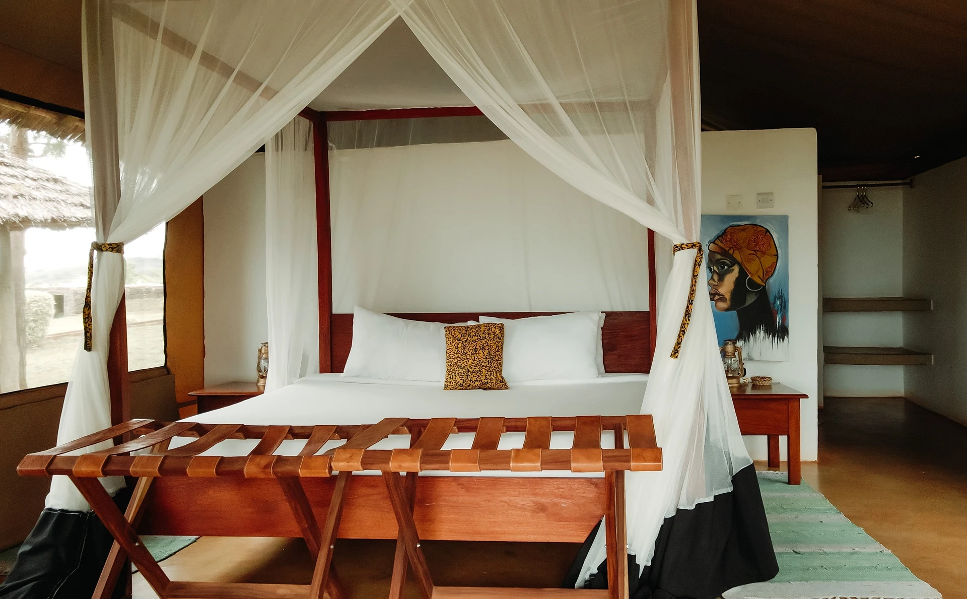 Karatu Lodge double bed mosquito net African art
